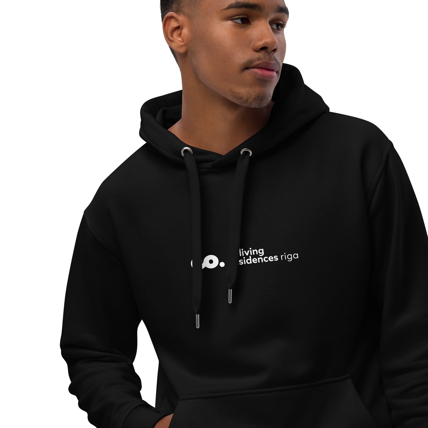 front view of a black man wearing a black hoodie with the Coliving Residences Riga logo