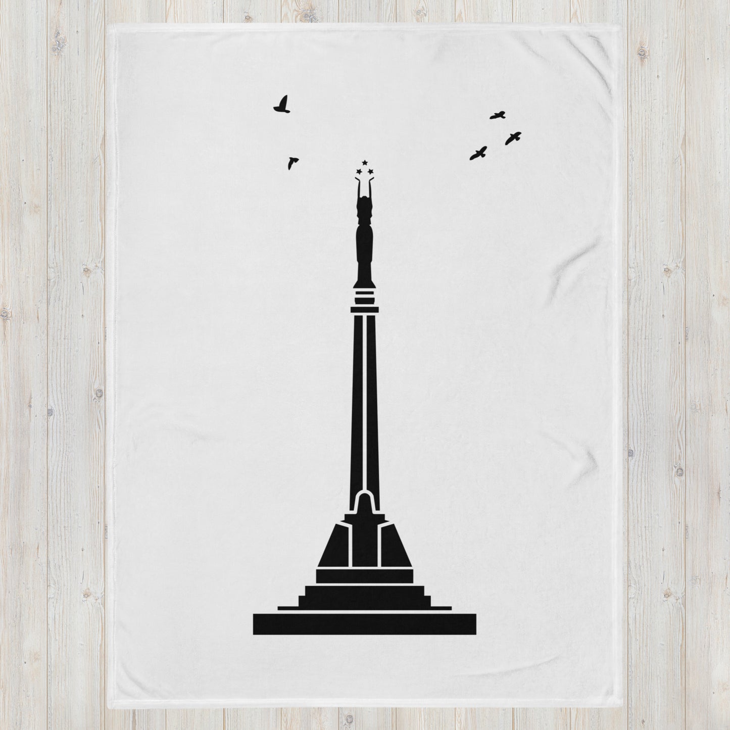 White flag featuring a black illustration of Riga's Freedom Monument
