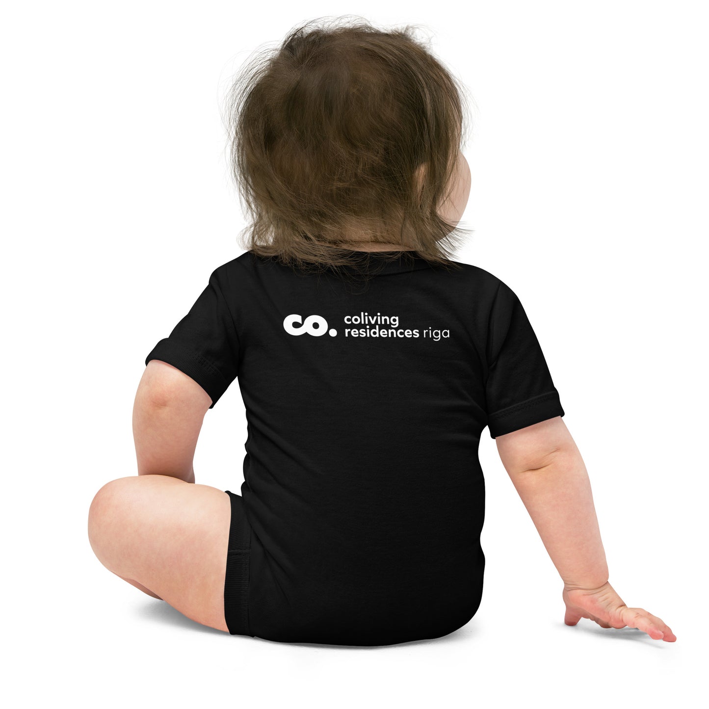 Back of baby wearing a black one piece featuring Coliving Residences Riga logo