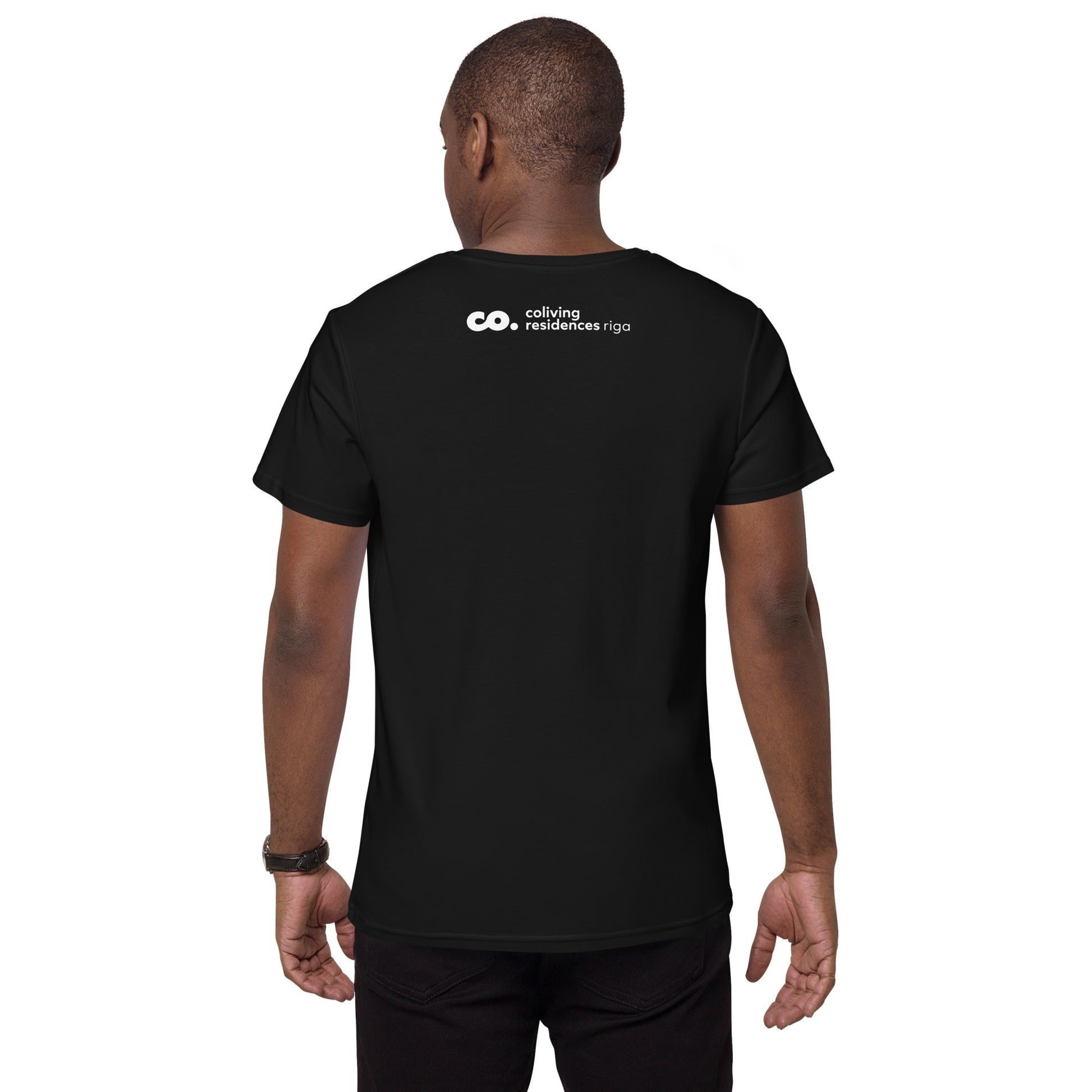 Back view of a Black man wearing a black t-shirt with a Coliving Residences logo