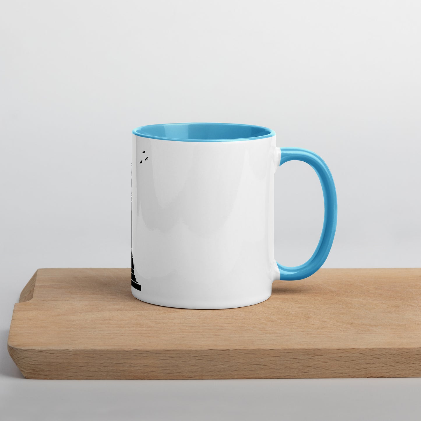 white coffee mug with blue inside