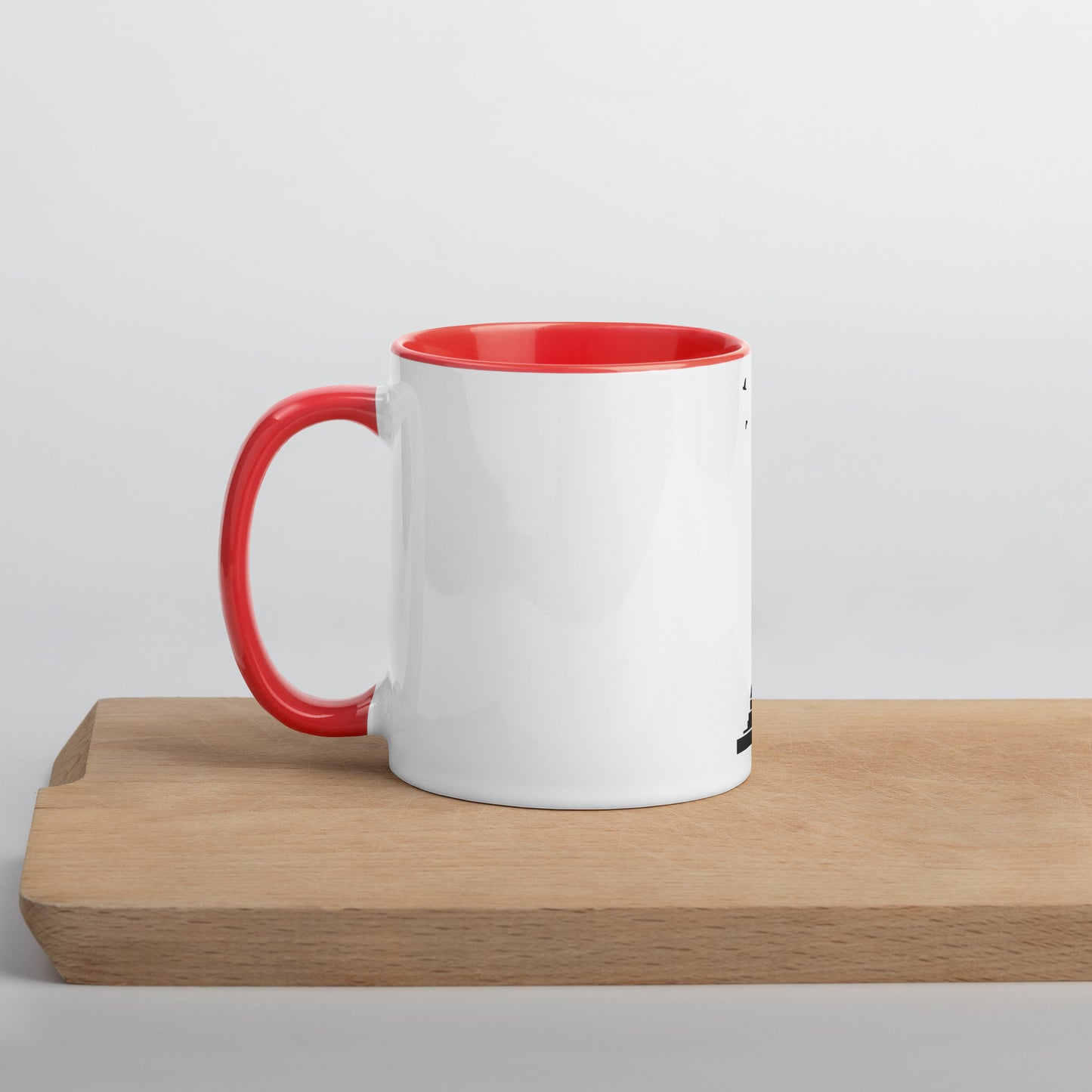 white coffee mug with orange inside